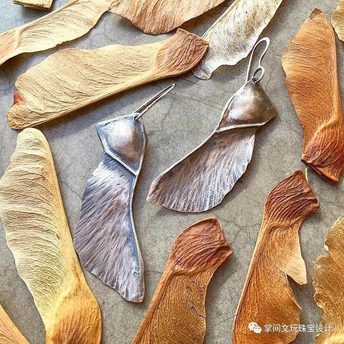 叶子,是不会飞翔的翅膀,翅膀,是落在天上的叶子